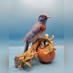 Blue and Red Bird Figurine on Branch